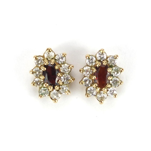 2382 - Pair of 9ct gold red and clear stone earrings