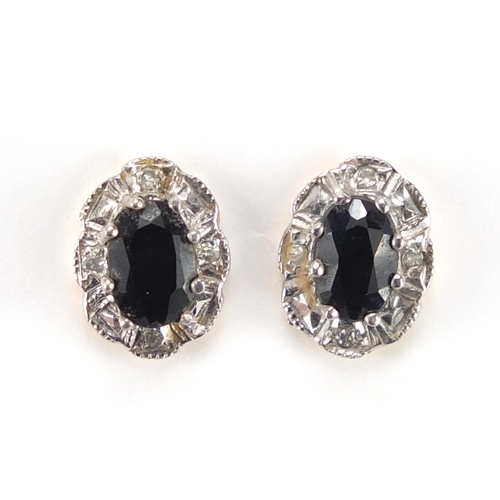 2376 - Pair of 9ct gold sapphire and diamond earrings, approximate weight 1.9g