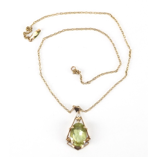 2372 - 9ct gold green stone pendant on a 9ct gold necklace, the pendant 2.5cm in length, approximate weight... 