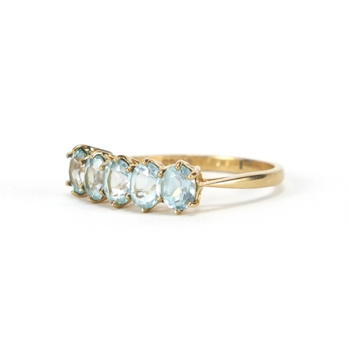 2394 - 9ct gold aquamarine five stone ring, size O, approximate weight 2.2g