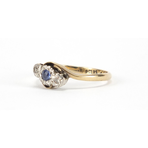 2404 - 9ct gold sapphire and diamond crossover ring, size P, approximate weight 2.0g