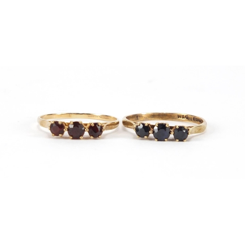 2403 - 9ct gold garnet three stone ring and 9ct gold sapphire three stone ring, both size Q, approximate we... 