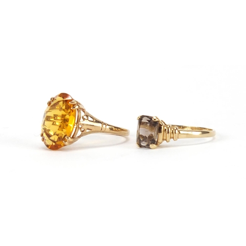 2440 - 9ct gold citrine ring and 9ct gold smoky quartz ring, both size M, approximate weight 4.0g