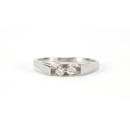2413 - 14ct white gold diamond two stone ring, size K, approximate weight 2.1g