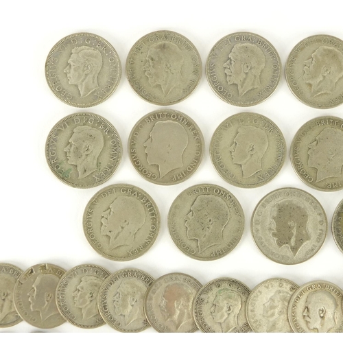 2302 - Mostly British pre 1947 coins including shillings and florins, approximate weight 320.0g