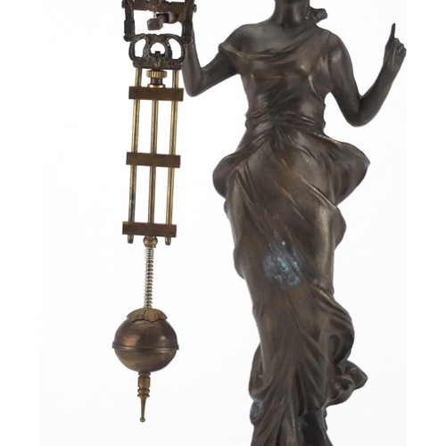 2165 - Patinated Spelter swinging mantel clock in the form of an Art Nouveau female, the clock by Junghans ... 