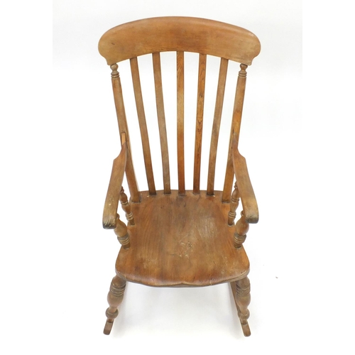 18 - Elm slat back rocking chair, 103cm high