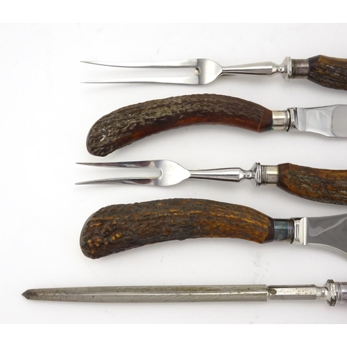 2201 - Five piece horn handled carving set, with stainless steel blades, retailed by Asprey Bond Street, ho... 