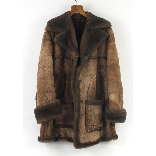 814 - Gentleman's sheepskin coat with Nurseys label, 90cm in length