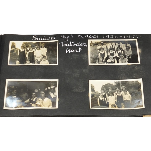 945 - Vintage black and white family photographs, some arranged in albums