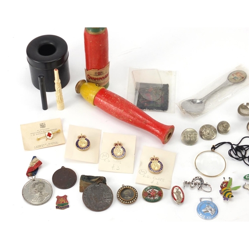 633 - Objects including silver teaspoons, silver rings, baseball tin markers, commemorative medallions and... 