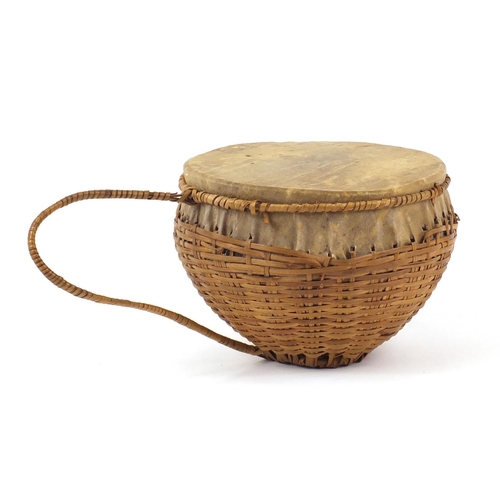 774 - Tribal nut and animal skin drum, 24cm in diameter