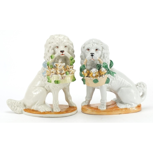 456 - Pair of German hand painted porcelain dogs, each 19.5cm high