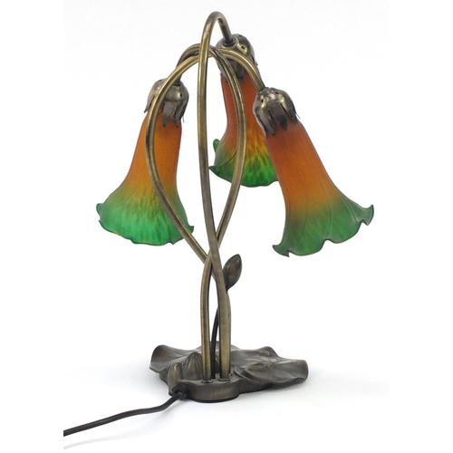 731 - Tiffany style table lamp with three glass tulip shades, 40cm high