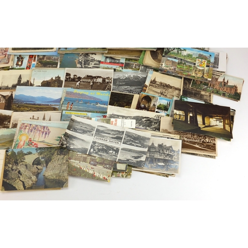 909 - Vintage and later postcards including street scenes