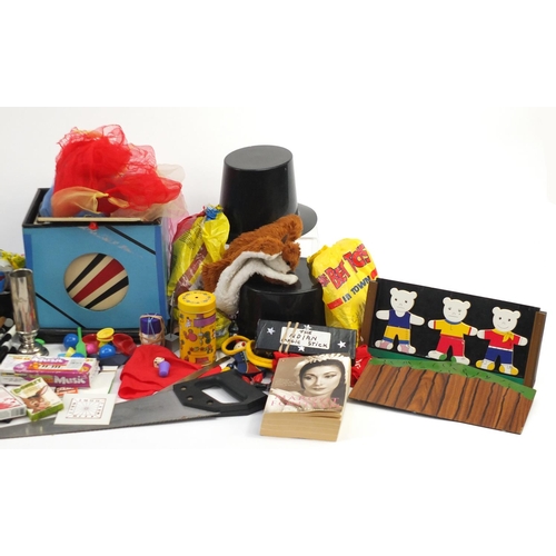 868 - Large selection of magicians items including magic tricks, toys, top hats and wands