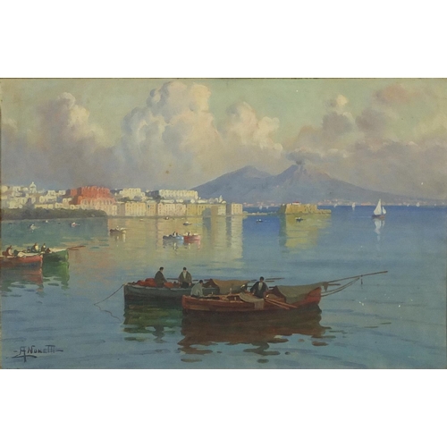 1240 - A Nonetti - Naples harbour with fishing boats, early 20th century oil, inscribed verso, mounted and ... 