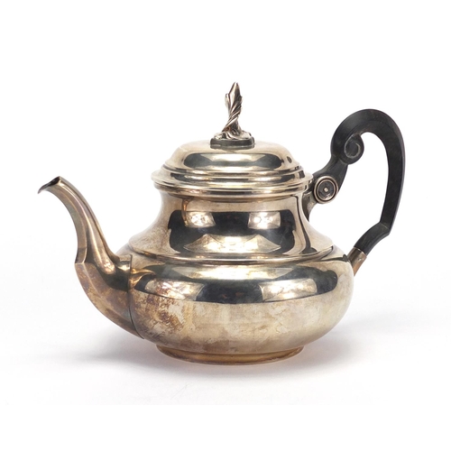 845 - Continental silver teapot with ebonised wood handle, impressed marks to the base, 21.5cm wide, appro... 