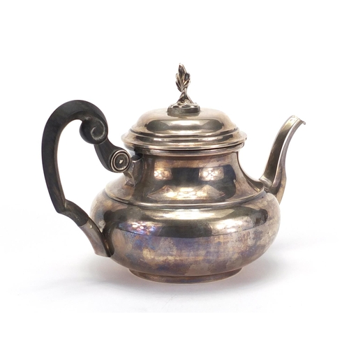 845 - Continental silver teapot with ebonised wood handle, impressed marks to the base, 21.5cm wide, appro... 