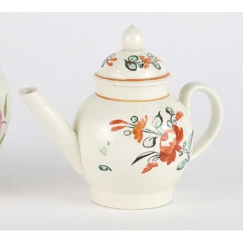 680 - Two early 19th century cream ware teapots including one by Wedgwood, both hand painted with flowers,... 