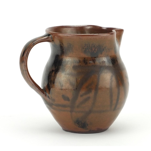 779 - Michael Cardew tenmuko glaze studio pottery jug, impressed marks, 9.5cm high