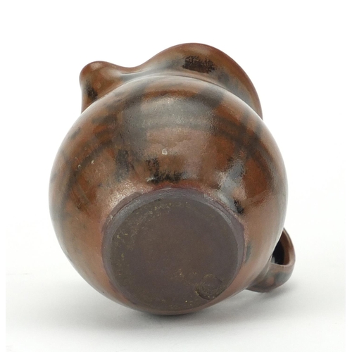 779 - Michael Cardew tenmuko glaze studio pottery jug, impressed marks, 9.5cm high