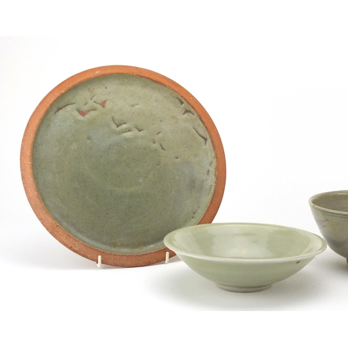 785 - St Ives studio pottery including a large bowl, celadon dish and plate, impressed marks, the largest ... 