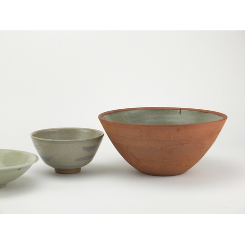 785 - St Ives studio pottery including a large bowl, celadon dish and plate, impressed marks, the largest ... 