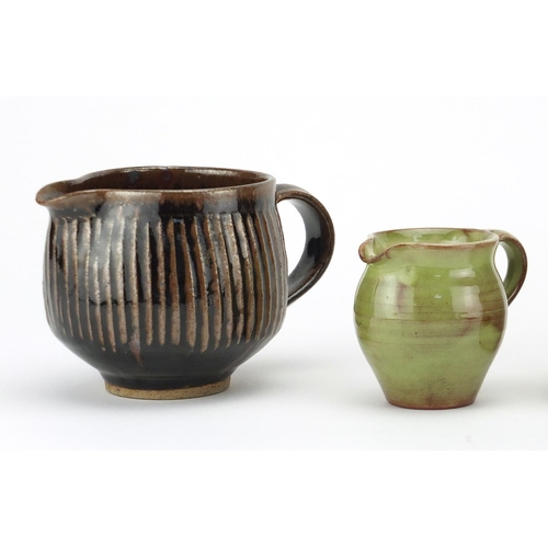 784 - David Leach and Lowerdown studio pottery comprising a jam pot, two jugs and a mug, impressed marks, ... 
