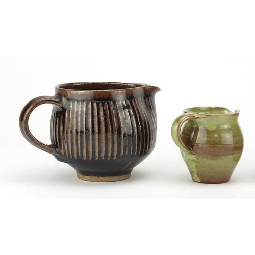 784 - David Leach and Lowerdown studio pottery comprising a jam pot, two jugs and a mug, impressed marks, ... 