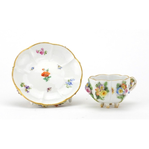 714 - Meissen porcelain six footed floral encrusted Demitasse cup and saucer, hand painted and with flower... 