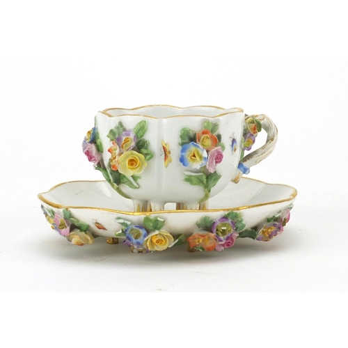 714 - Meissen porcelain six footed floral encrusted Demitasse cup and saucer, hand painted and with flower... 