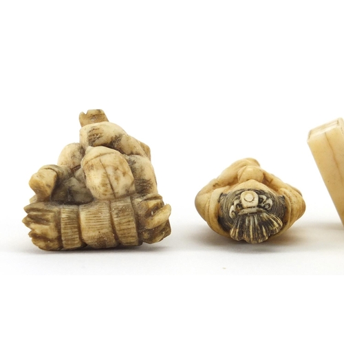 522 - Three Japanese carved ivory Netsuke's and an okimono of an actor, the largest 5.2cm high