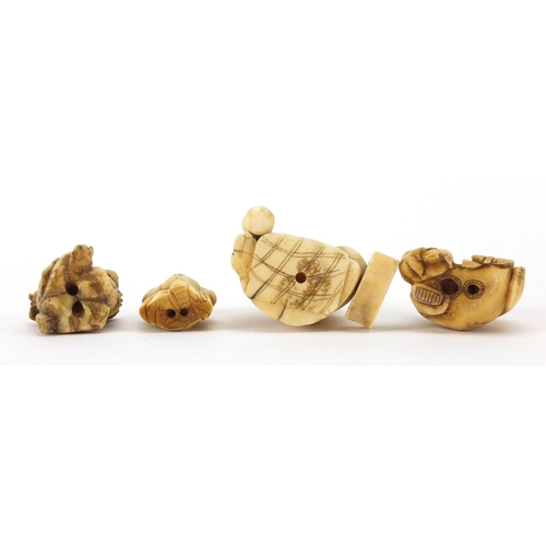 522 - Three Japanese carved ivory Netsuke's and an okimono of an actor, the largest 5.2cm high