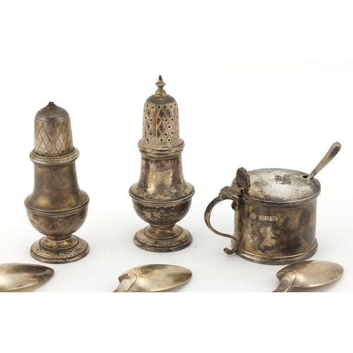 876 - Silver three piece cruet and seven Victorian Irish silver spoons, the cruet by Apsrey & Co Ltd, the ... 