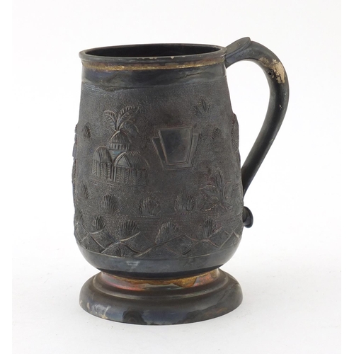 854 - Indian unmarked silver tankard embossed with a farmer and cattle, 13cm high, approximate weight 347.... 