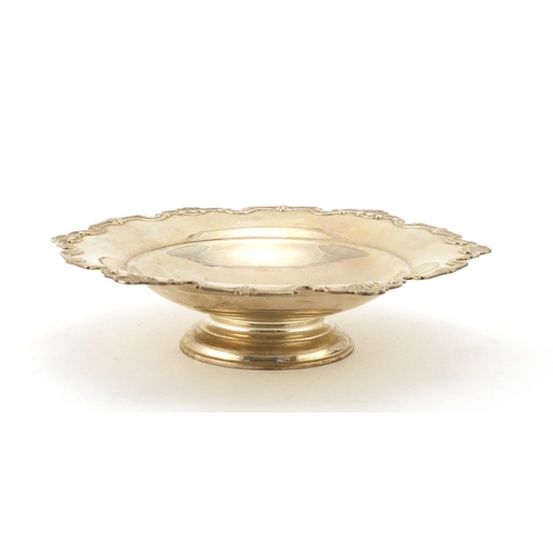 874 - Circular silver footed bowl with stylised shell shaped border, by Mappin & Webb Sheffield 1959, 24cm... 