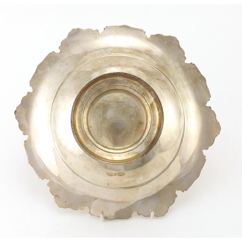 874 - Circular silver footed bowl with stylised shell shaped border, by Mappin & Webb Sheffield 1959, 24cm... 