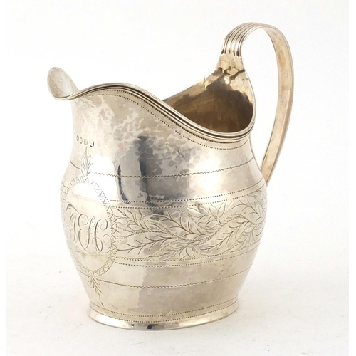 863 - Georgian silver cream jug, engraved with foliage, incomplete makers mark London 1803, 12cm high, app... 