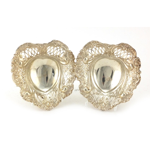 836 - Pair of Victorian silver love heart shaped bon bon dishes, embossed and pierced with flowers, by Wil... 