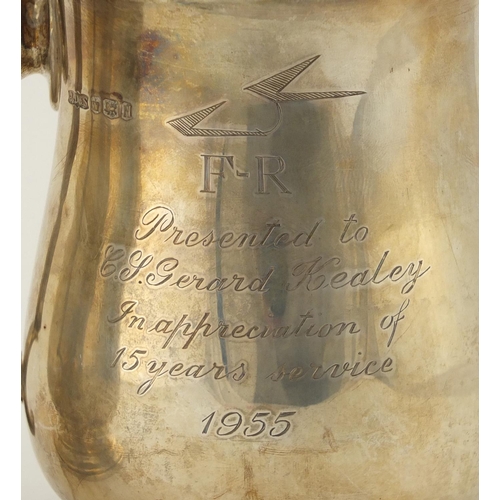 826 - Two silver tankards, Birmingham and Sheffield hallmarks, the largest 13.5cm high, approximate weight... 