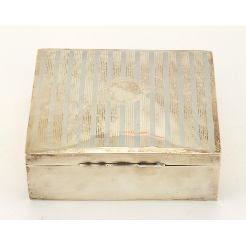 862 - Rectangular silver cigar box, the hinged lid with engine turned decoration, by William Adams Ltd Bir... 