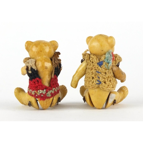 144 - Two German bisque teddy bears with jointed limbs by Hertwig, each 5.5cm high