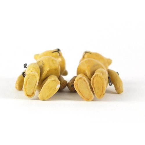 143 - Two German bisque teddy bears with jointed limbs by Hertwig, each 5.5cm high