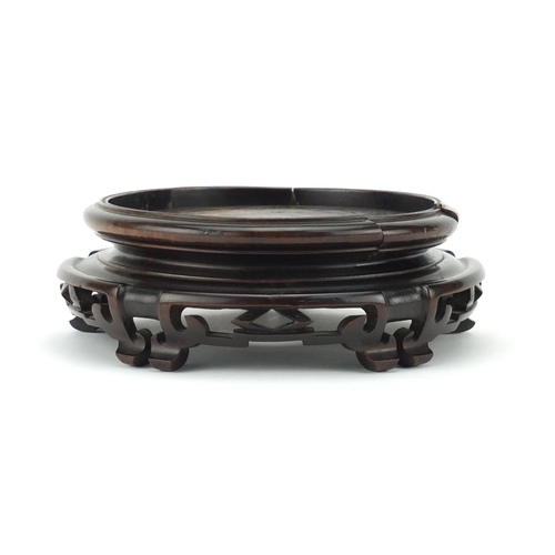 580 - Good Chinese carved hardwood circular stand, 6cm high x 18cm in diameter