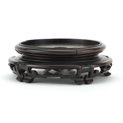 580 - Good Chinese carved hardwood circular stand, 6cm high x 18cm in diameter