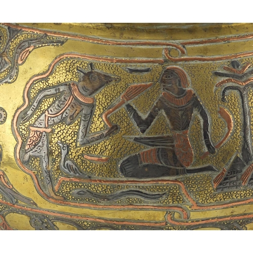 645 - Egyptian Cairo Ware brass bowl with copper and silver inlay, decorated with sphinx's, crane's and fo... 