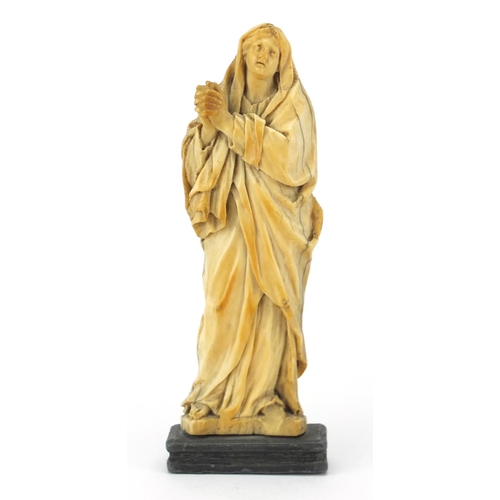 104 - Good 16th/17th century continental ivory carving of Madonna, raised on a rectangular lead base, 19cm... 