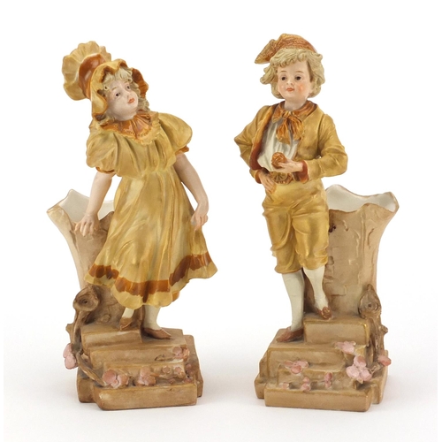 775 - Pair of Austrian figural porcelain spill vases by Ernst Wahliss of young children, each with factory... 