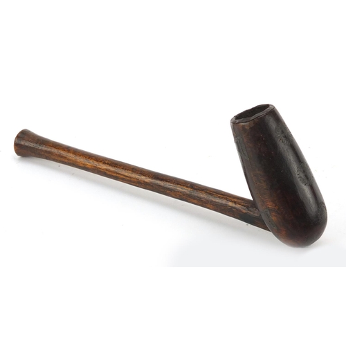 662 - African Xhosa pipe with metal inlay and a Tonga knife, the largest 30.5cm in length